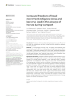 Increased freedom of head movement mitigates stress and bacterial load in the airways of horses during transport