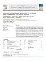 Ambient wind direction impacts on the performance of a CO2 direct air capture system determined using large eddy simulations